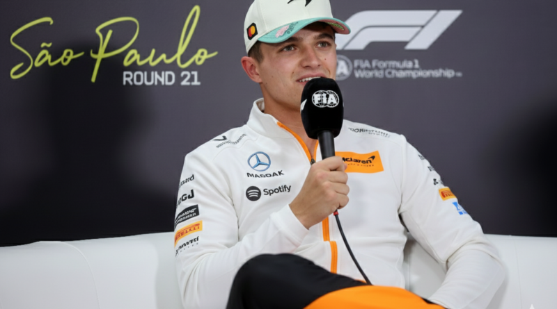 Lando Norris in McLaren F1 car action shot racing on track